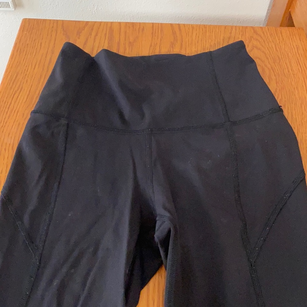 Lululemon leggings with detailed holes in the bottom